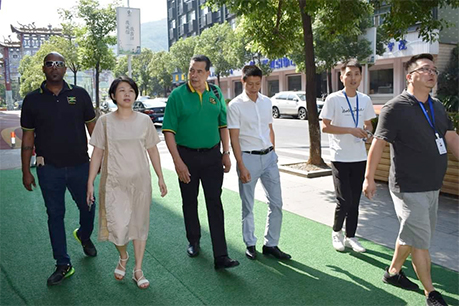 Then Mayor of Montego Bay, Councillor Homer Davis stroll with friends in China