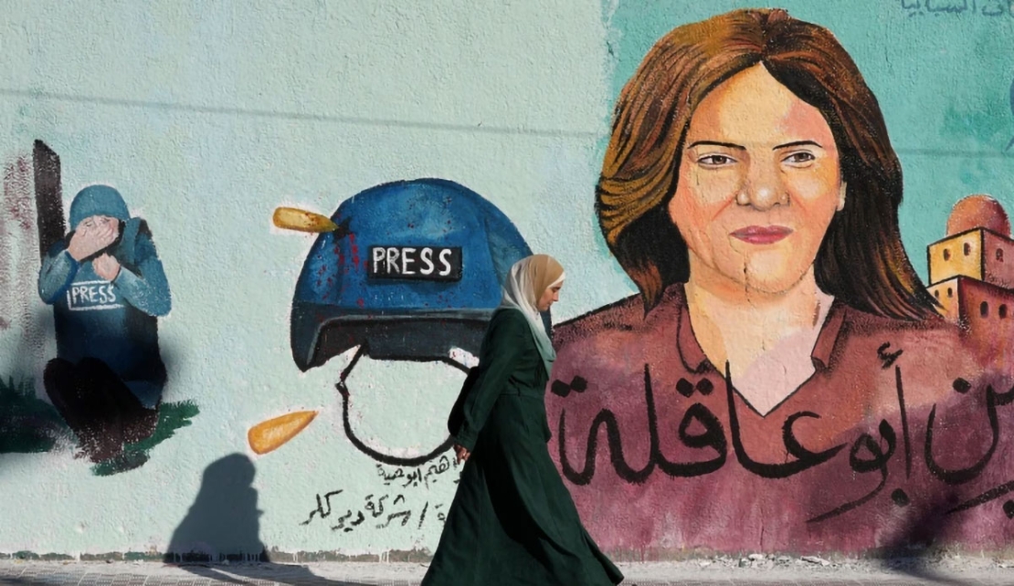 A mural of slain Al Jazeera journalist Shireen Abu Akleh adorns a wall in Gaza City, on Sunday, May 15, 2022 [File: Adel Hana/AP Photo]
