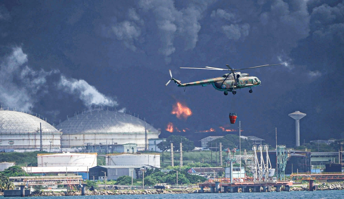 CUBA | Call Me! Washington's Refrain of Generosity, while Cuba’s oil storage tank burns