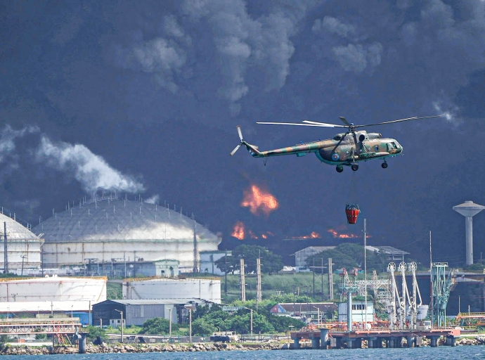CUBA | Call Me! Washington's Refrain of Generosity, while Cuba’s oil storage tank burns