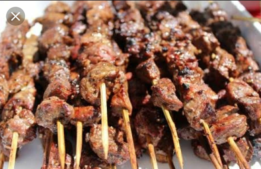Hatian goat kabobs on skewers