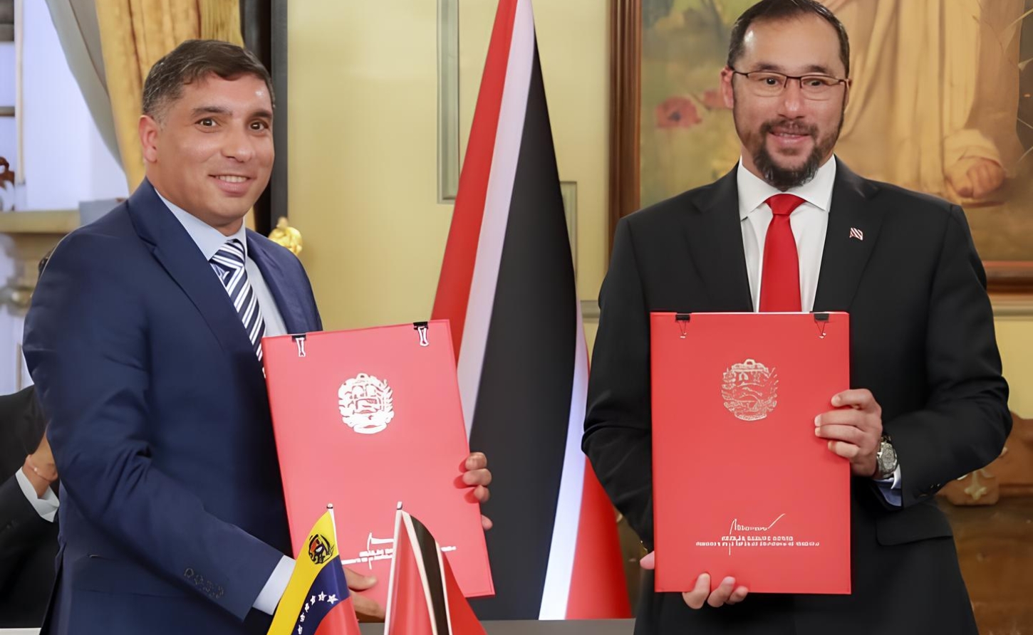 FLASHBACK: Venezuelan Oil Minister Pedro Tellechea, left; and then Energy Minister, now, PM Stuart Young, at the signing ceremony for the Dragon Gas field licence in Caracas, Venezuela in December 2023. -