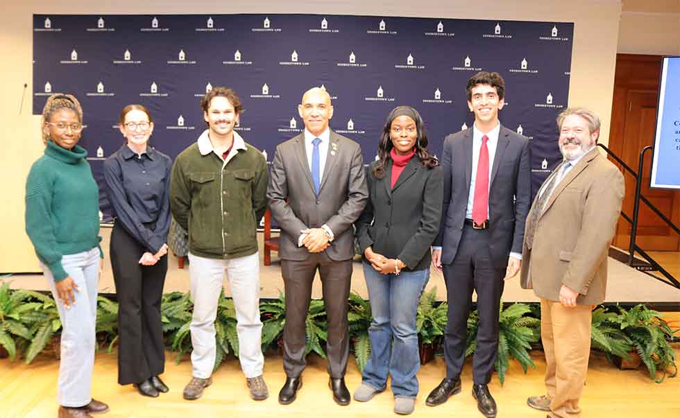 Jamaica’s Ambassador to the United States (US), His Excellency Major General (Ret’d) Antony Anderson (center), posed for a photograph with second year law students at Georgetown University after he addressed the public forum organized by the George Town University Law faculty on  Jamaica’s Role in Regional Security.on Thursday, February 5th, 2026 at the Gewirz Student Center at the university in Washington D.C. On the right is moderator Director of Georgetown National Security Law Program, Todd Huntley. Photo Derrick Scott.