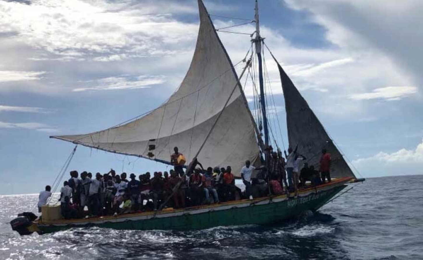 Haitian Refugees fleeing their homeland in search of safe haven, anywhere !!