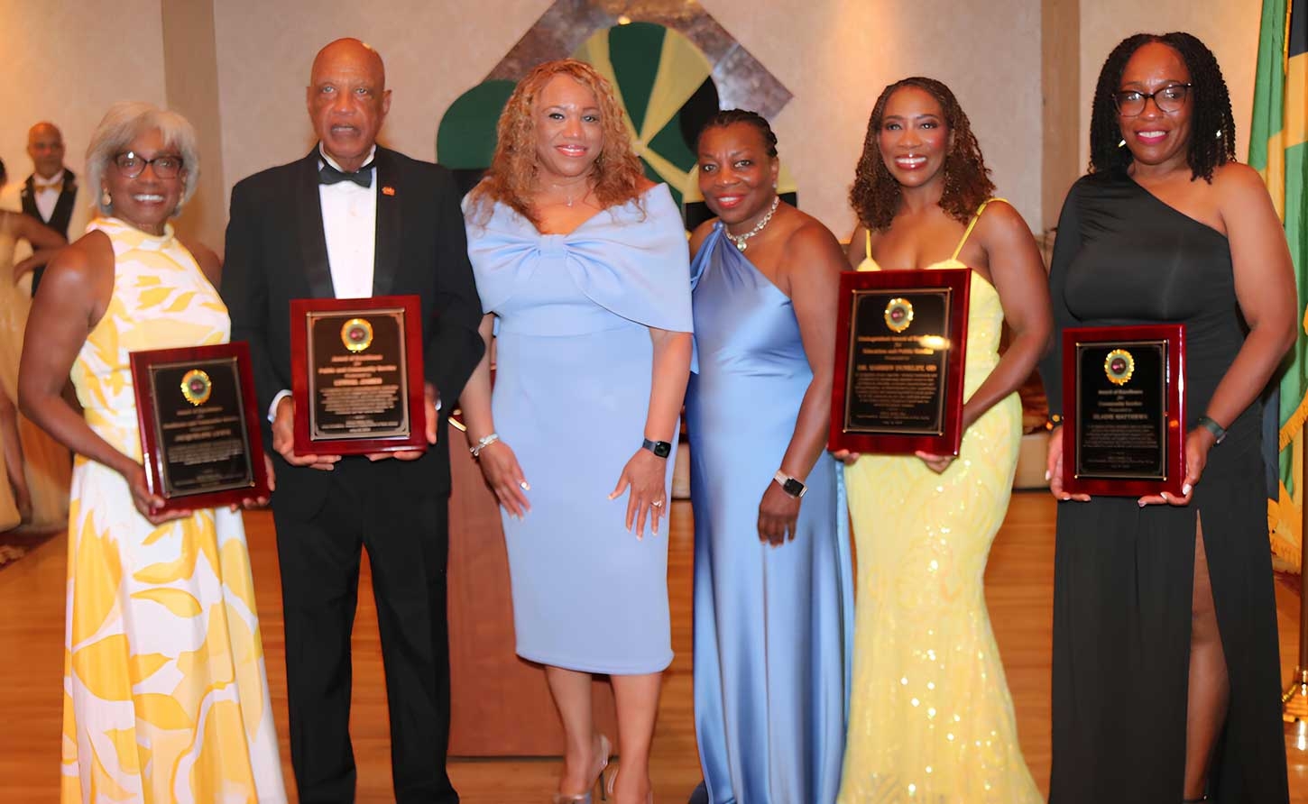 Mayor of Highland Park Elsie Foster (3rd from left) and President Jamaica Organization of New Jersey JON-J Board of Trustees Valerie Bailey, are flanked from left by awardees Jacqueline Lewis, Lynval James, Dr. Karren Dunkley, and Elaine Matthews (Photo by Derrick Scott)