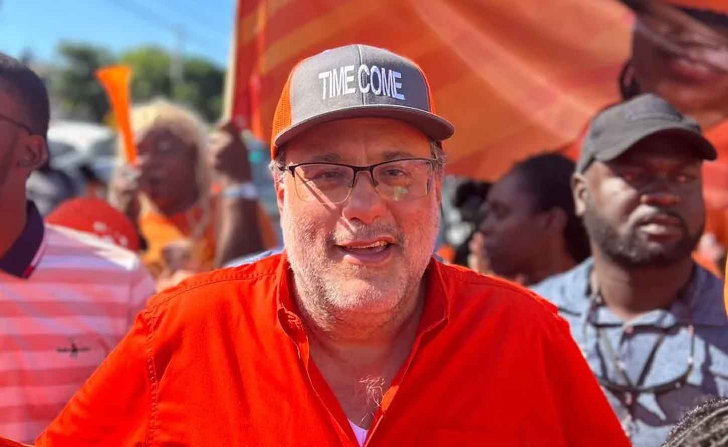 PNP President Mark  Golding on his way to the nomination centre on Monday to confirm his candidacy.
