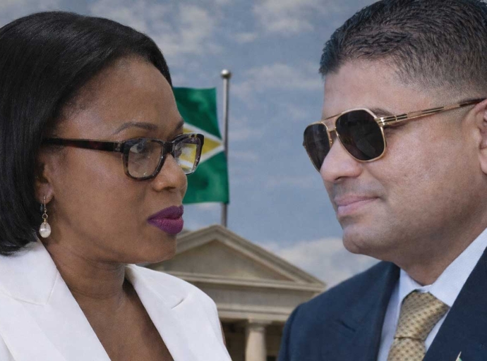 Home Affairs Minister Oneidge Waldron and MP Azruddin Mohamed who is fignting extradition to the USA.