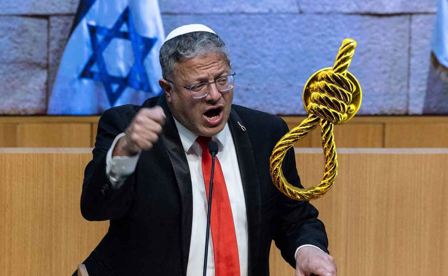 Israel’s National Security Minister and zionist zealot, Itamar Ben Gvir, who not only celebrated by drinking champagne on the Knesset floor, but also by wearing a pin in the shape of a noose. 