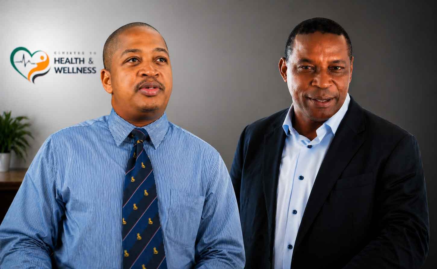 Neurosurgeon Dr. Roger Hunter (left), and UHWI’s chief doctor, Dr. Carl Bruce (right).