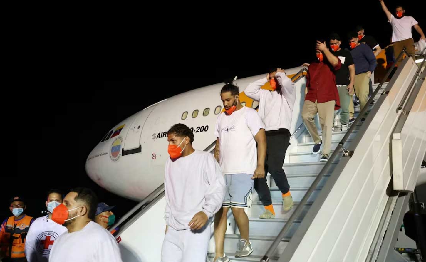 Migrants deported from the United States disembark from a plane in Caracas, Venezuela, March 28, 2025.
