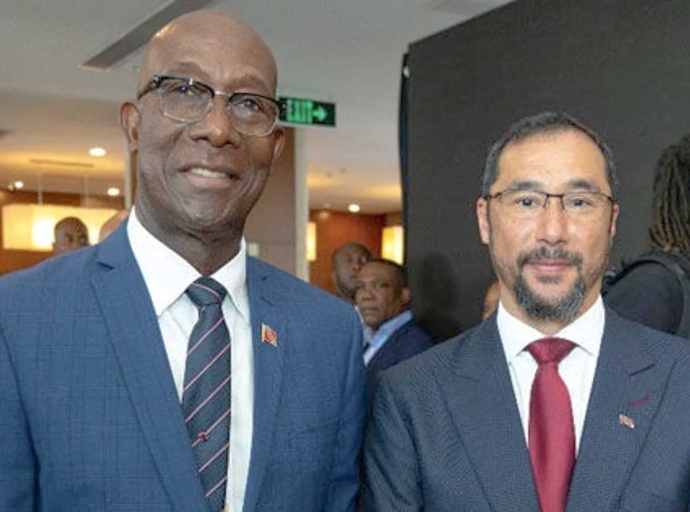 Fortmer Prime Minister Dr Keith Rowley, left, and former PM  Stuart Young at the Guyana Energy Conference and Supply Chain Expo 2024 in Georgetown, Guyana.