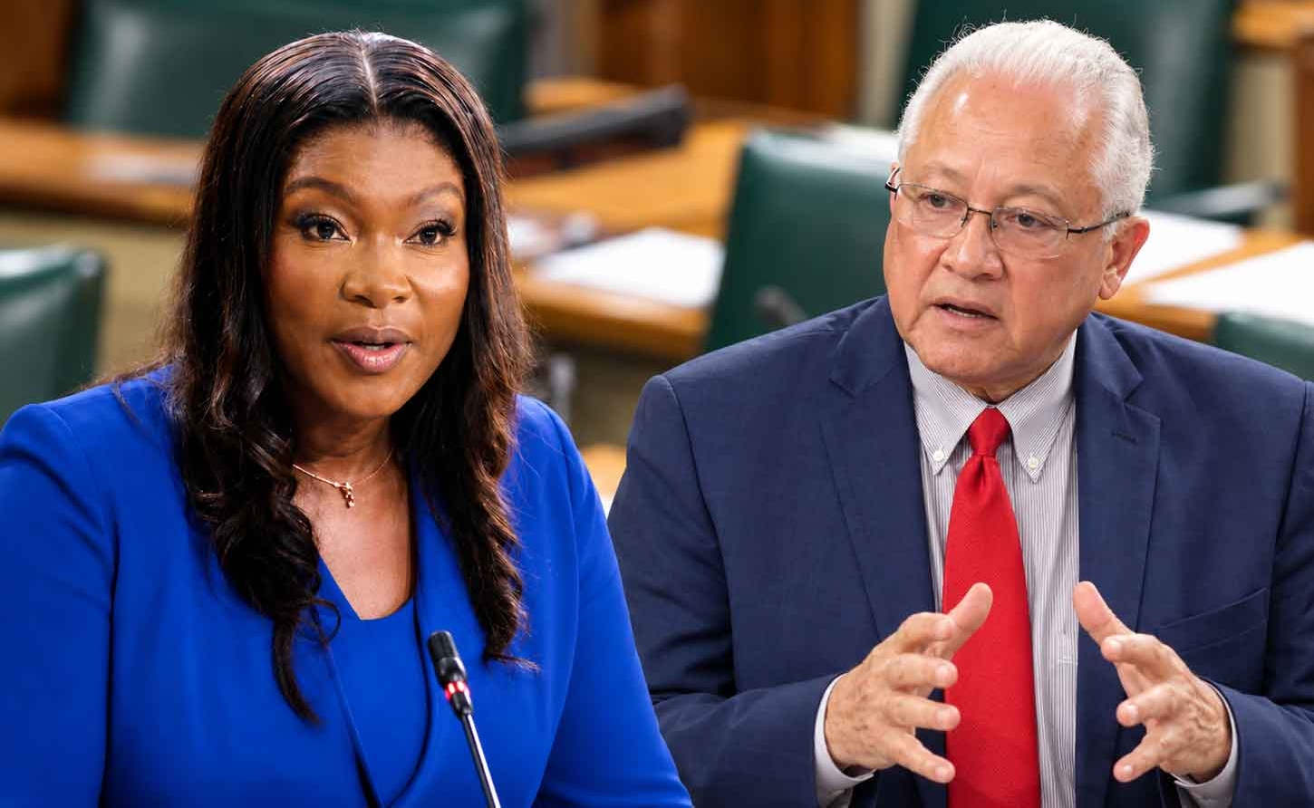 Opposition Spokesperson on Justice, Miss Zuleika Jess, MP and Minister of Justice Delroy Chuck 