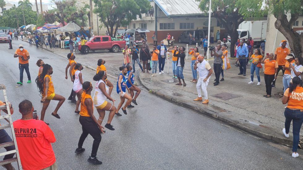 Dancin’ Africa dancers performing during an impromptu Peter Ram performance at Cheapside in the City, during yesterday’s motorcade as part of the Food and Rum Festival 2022 launch. (A. Reid/BGIS)
