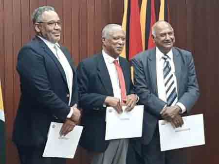Chairman of the Commission of Inquiry Justice Stanley John (centre) flanked by Former Attorney General, High Court Judge and Acting Justice of Appeal in the Eastern Caribbean, Godfrey P. Smith and Retired Chancellor of the Judiciary of Guyana, Justice Carl Singh.