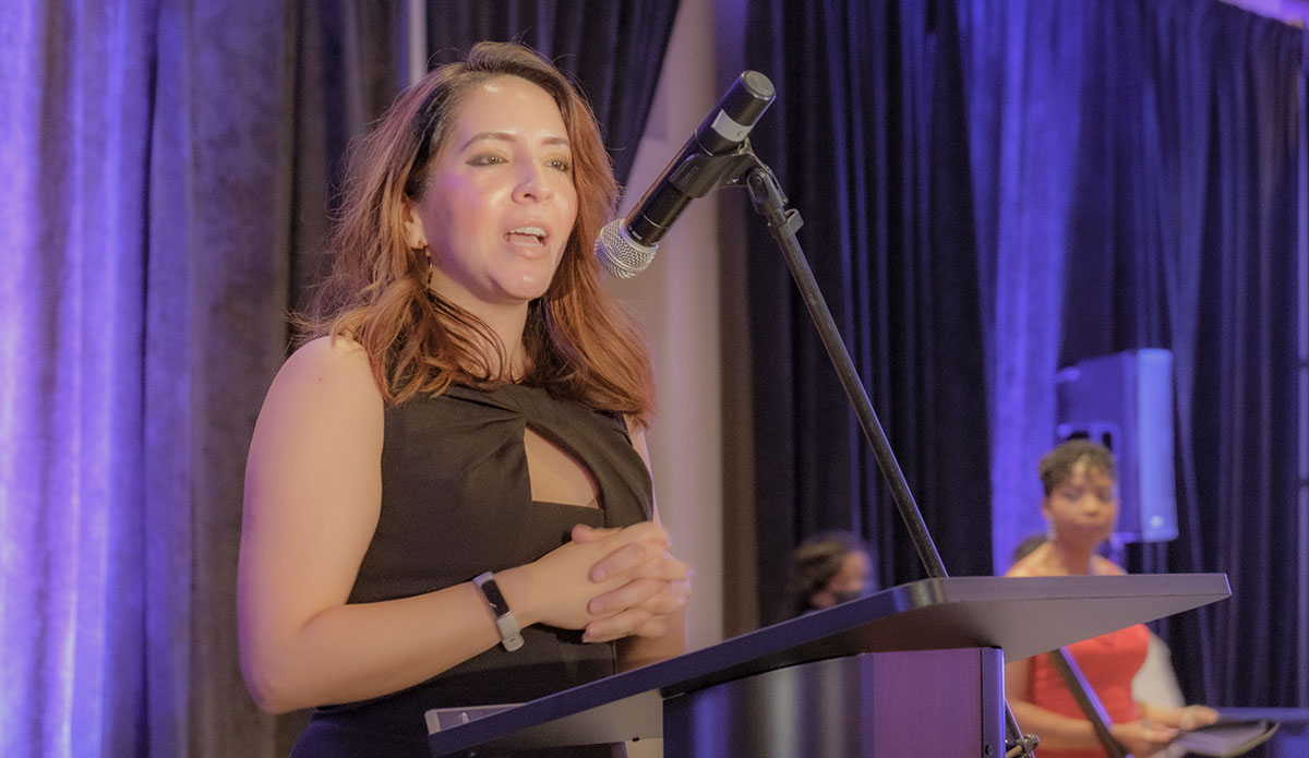 The Advisor in the Office of Public Engagement and Intergovernmental Affairs in the Office of the Vice President, Danielle K Decker, delivers remarks from US Vice President Kamala Harris at the 29th Annual Caribbean American Heritage Awards Gala.