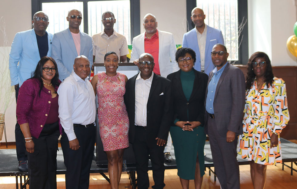 Falmouth’s Mayor Colin Gager (centre) and Assembly District Leader Ms Saran Purcel along with Councillor for the Falmouth Division Garth Wilkinson, and Councillor for the Martha Brae Division Roydell Hamilton (third from left in the back row) pose for a photograph with the members of the Board of the Friends of Falmouth organization. | Derrick Scott Photo