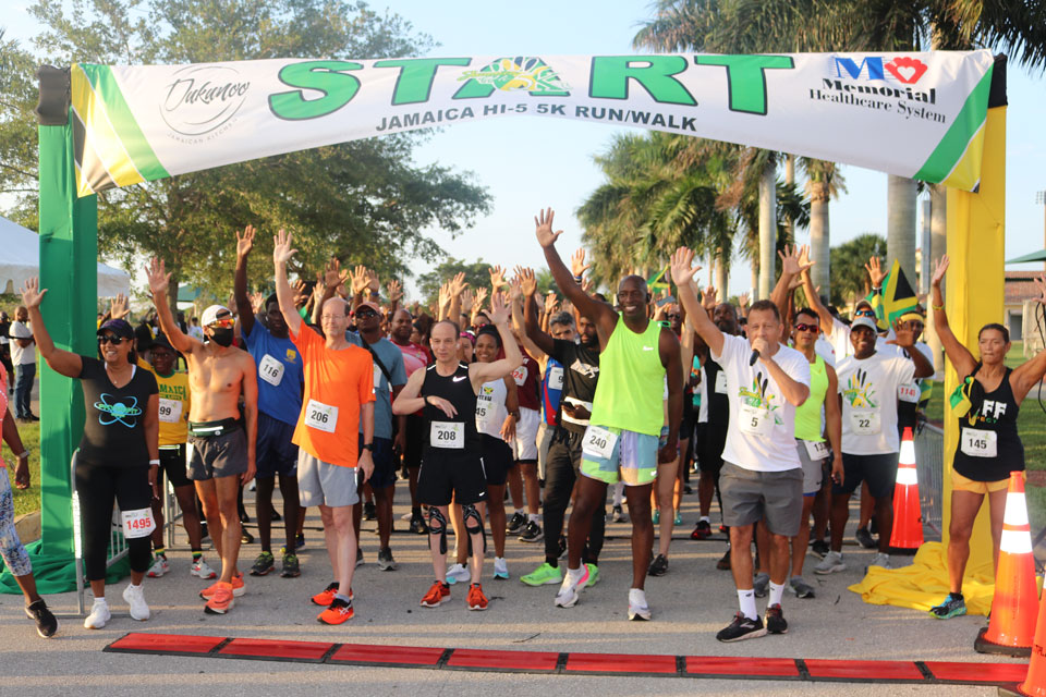 Jamaica’s Consul General in Miami Oliver Mair gives starting orders to the participants in the 5th annual 5K Walk-Run which was held as part of the activities commemorating Jamaica-60 independence launch at the Miramar Park in Fort Lauderdale.|Derrick Scott Photo