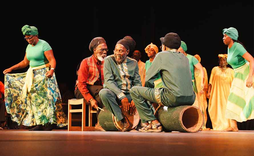 Kumina drumming and Ritual (L-R): Jenese ‘Meme’ Lewis, Steve Golding playing catta-tick, and lead drummer Gabu Wedderburn with other members.