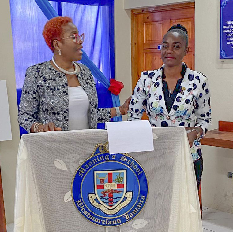Scholarship Committee Member Carol Newman acknowledges Guidance Counselor Mrs. Paula Hall-Bedassie.