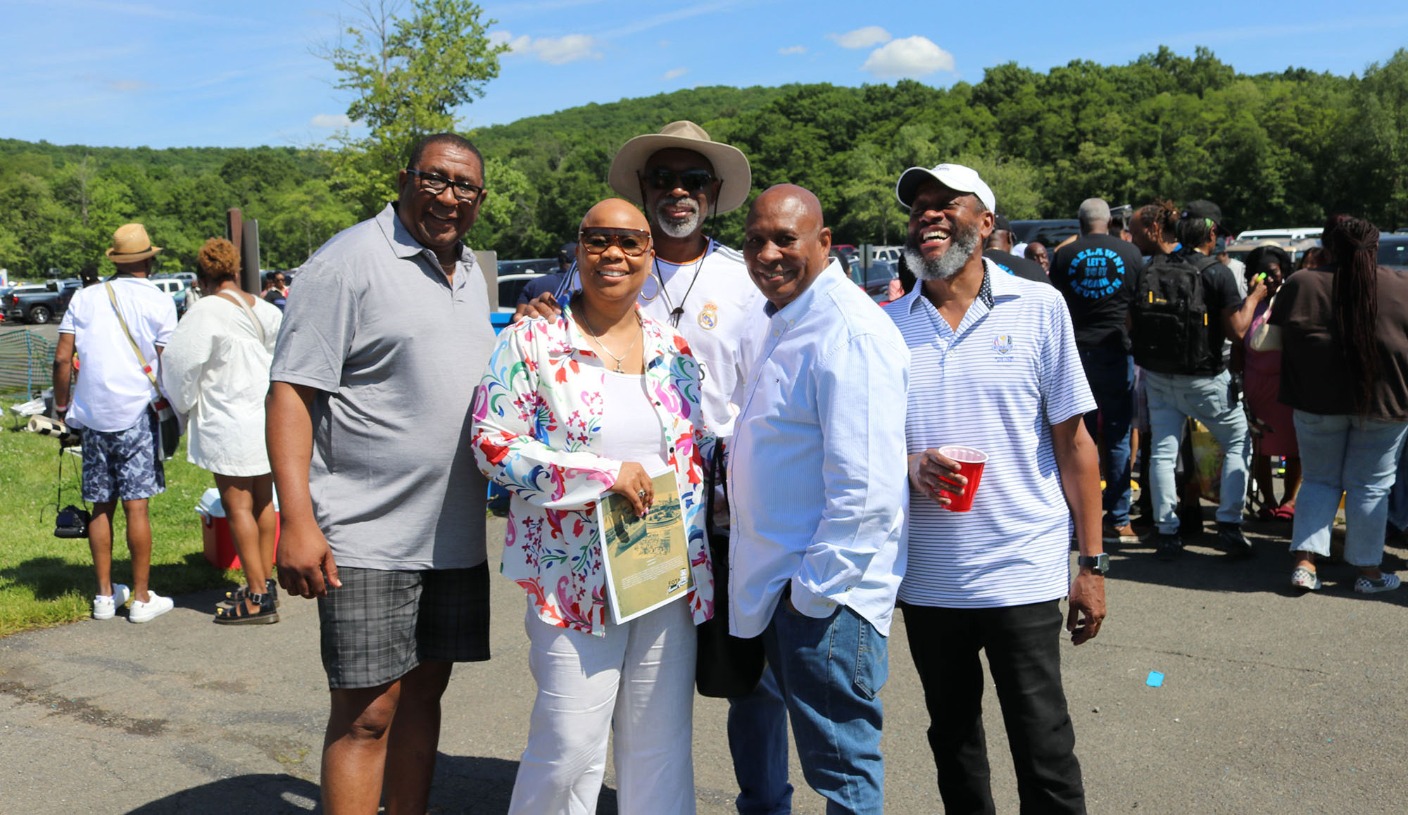One of the founders of the Trelawny annual picnic, Richard Chambers (centre) along with (from left) Baldwin Huie, Dahlia Gordon, Oliver Huie and Paul Earle at the annual Trelawny picnic on Sunday May 29 at the Rockland County State Park in Nyack New York. (PHOTO Derrick Scott)