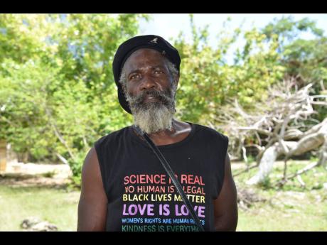 Richard Douglas McCloud, resident, says “I have been paying tax on the land for about seven years now, so they want to move people and smash down our houses.”
