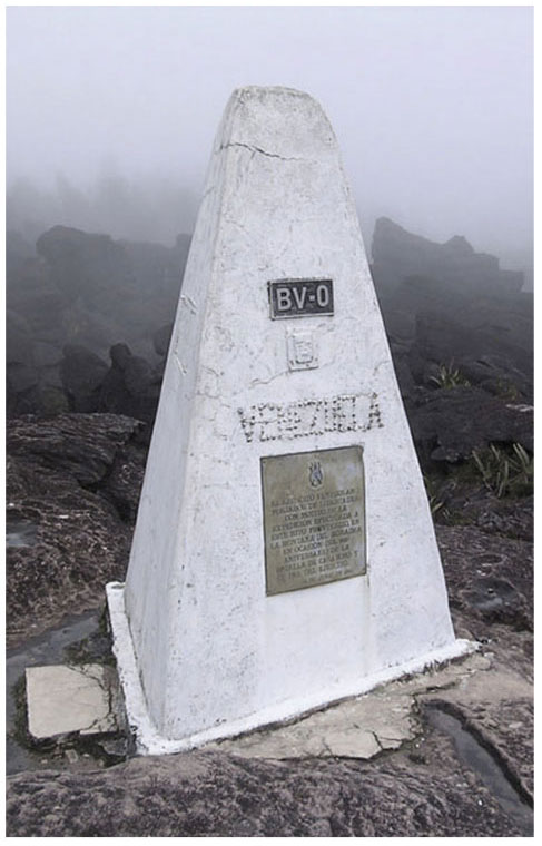 TRI Juntion Point Mt Rorima. a whitewashed stone pyramidal structure about seven feet tall, which marks the tripoint where the borders of Venezuela, Brazil, and Guyana all meet.