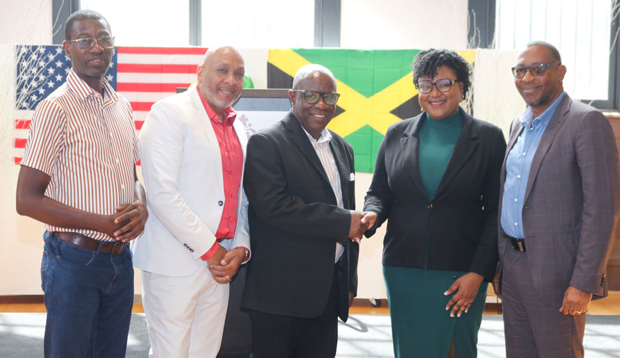 Falmouth’s Mayor His Worship Councillor Colin Gager received a warm welcome from Assembly District Leader Saran Purcel. Sharing in the occasion are from left, Councillor for the Martha Brae Division Roydell Hamilton, President of the Friends of Falmouth Michael Watkiss, Councillor for the Falmouth Division Garth Wilkinson.| Derrick Scott Photo