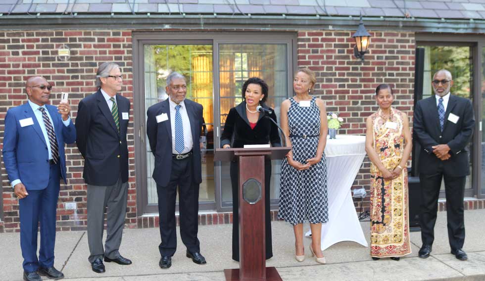 Jamaica's Ambassador to the United States Audrey Marks addresses the signing ceremony of a Memorandum of Understanding between the University of the West Indies, UWI, and the State University of New York at Buffalo, SUNY, have signed a memorandum of understanding,MOU, to help achieve the United Nations 2030 Sustainable Development Goals and to facilitate programmes to foster and develop cooperative relationships between both universities. She is flanked from left by Dr. Rudolph Willis of NAJASO, SUNY Board member Mr. Bill Pierce, NAJASO Board Chair Dr. Richard Constable, NAJASO Secretary Ms Beverly Morris, NAJASO President Dr. Joyce EL Ali, and President of the Jamaica Buffalo and America Association, Mr. Garth Gibbs. Ambassador Marks paid tribute to these persons as the conceptualizers of the programme.