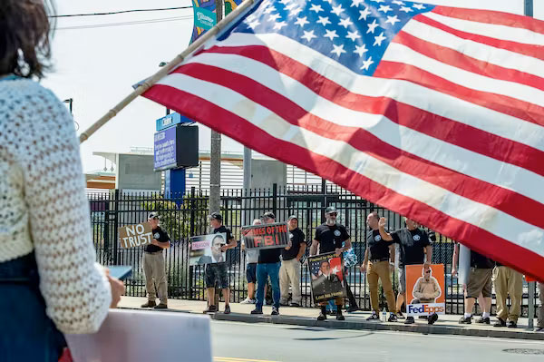 Demonstrators protest the FBI outside of its Boston headquarters on Aug. 21, 2022. Joseph Prezioso/AFP via Getty Images