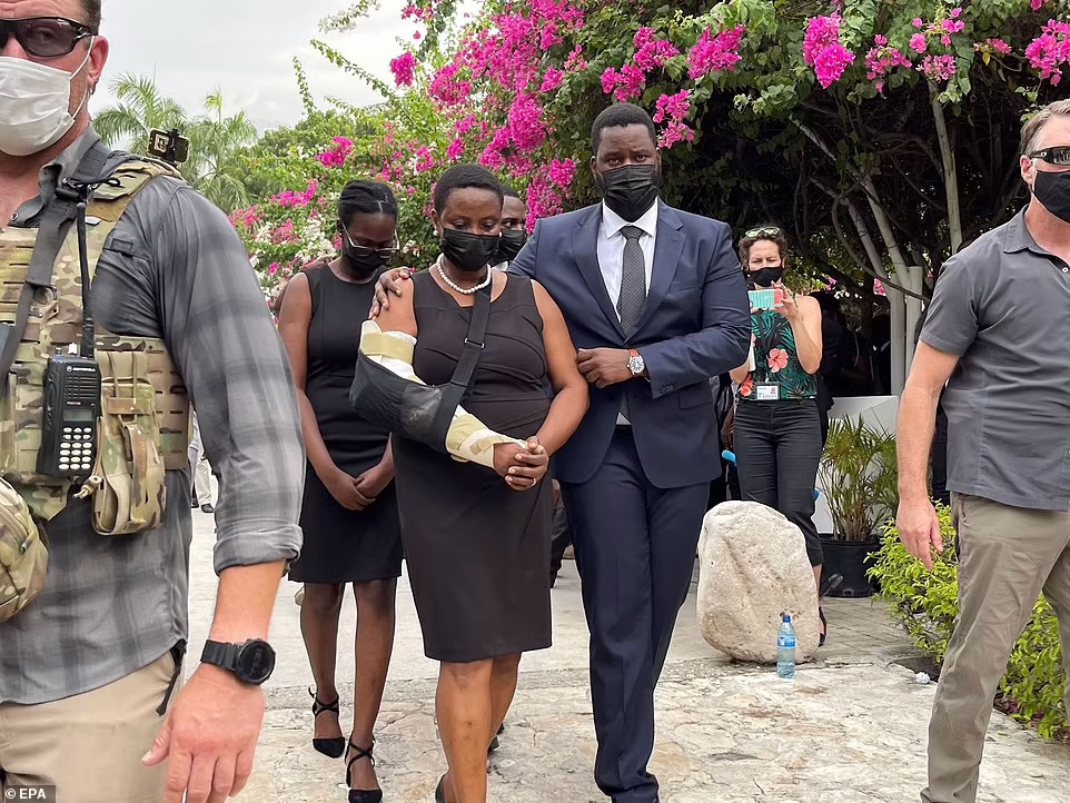 Haitian former first lady Martine Moise seen in sling at tribute for assassinated president Jovenel Moise. She has now been implicated in the assassination of her husband Jovenel Moise.