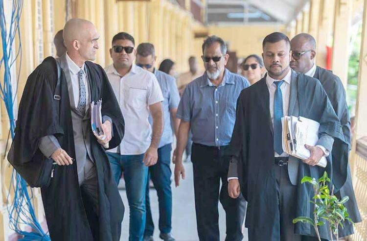 The Mohameds and their legal team