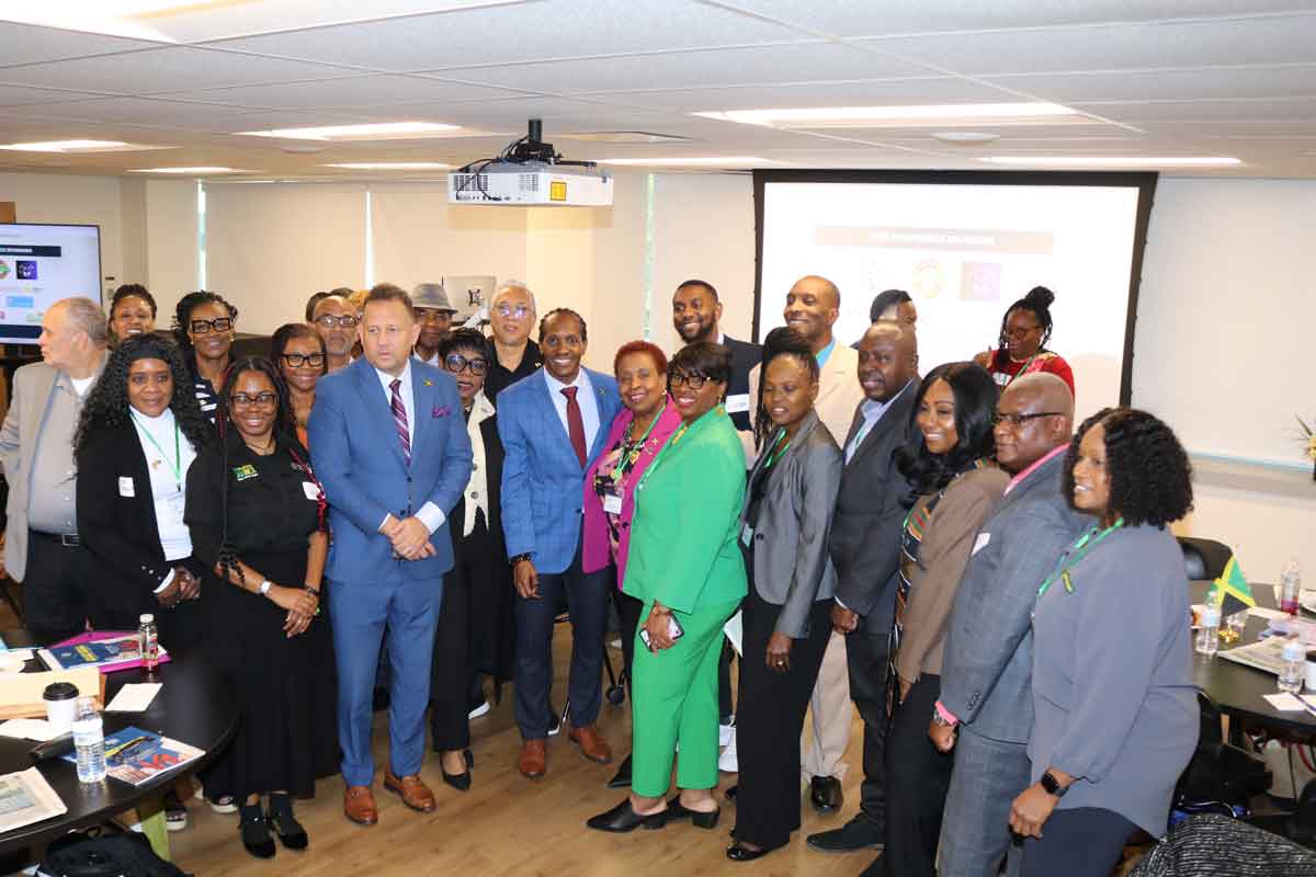 Minister of State in the Ministry of Foreign Affairs and Foreign Trade Hon Alando Terrelonge engages  with delegates at the town hall meeting at the second Jamaica Diaspora Northeast USA Conference at Temple University in Philadelphia on Saturday, October 24 .2026. Photo Derrick Scott.