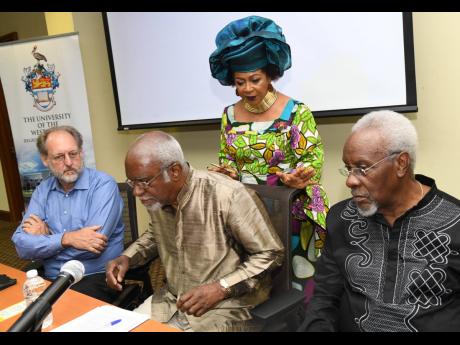 Professor Verene Shepherd (second right) looks on as Dr Coleman Bazelon, practice co-leader: intellectual property, Brattle Group; Judge Patrick Robinson (centre), former honorary president of the American Society of International Law and P.J. Patterson, former prime minister of Jamaica and statesman in residence of P.J. Patterson Institute for Africa-Caribbean Advocacy of The UWI, at the launch of the report on the quantification of reparation for transatlantic chattel enslavement in the Americas and Caribbean.