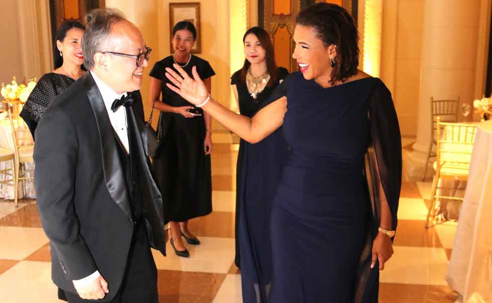 Ambassador Audrey Marks right shares I light moment with  Thailand Ambassador to the United States His Excellency Dr Suriya  Chindawongs who all so was a recipient  of 2026 Golden Heart Award from the Tree of Life Foundation at the awards glittering ceremony held last evening at the upscale Breakers Palm Beach Resort in Florida. Photo Derrick Scott.
