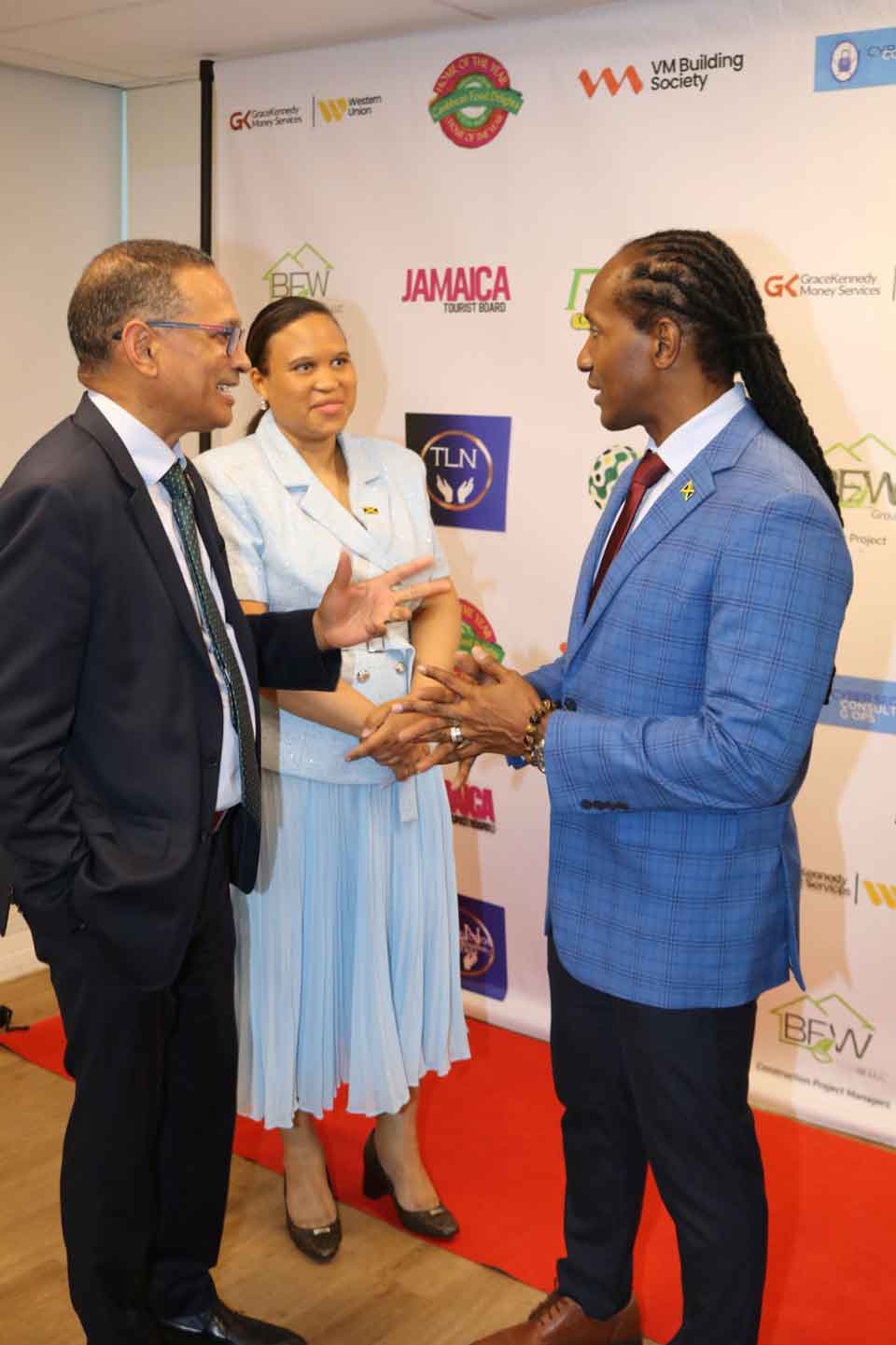 Minister of State Alando N. Terrelonge, Brian Wallace, Jamaica’s Ambassador to the United Nations; and Lishann Salmon, Chargé d’Affaires at the Embassy of Jamaica in Washington, D.C., share in a discussion during the second Jamaica Diaspora Northeast USA Conference. Photo by Derrick Scott.