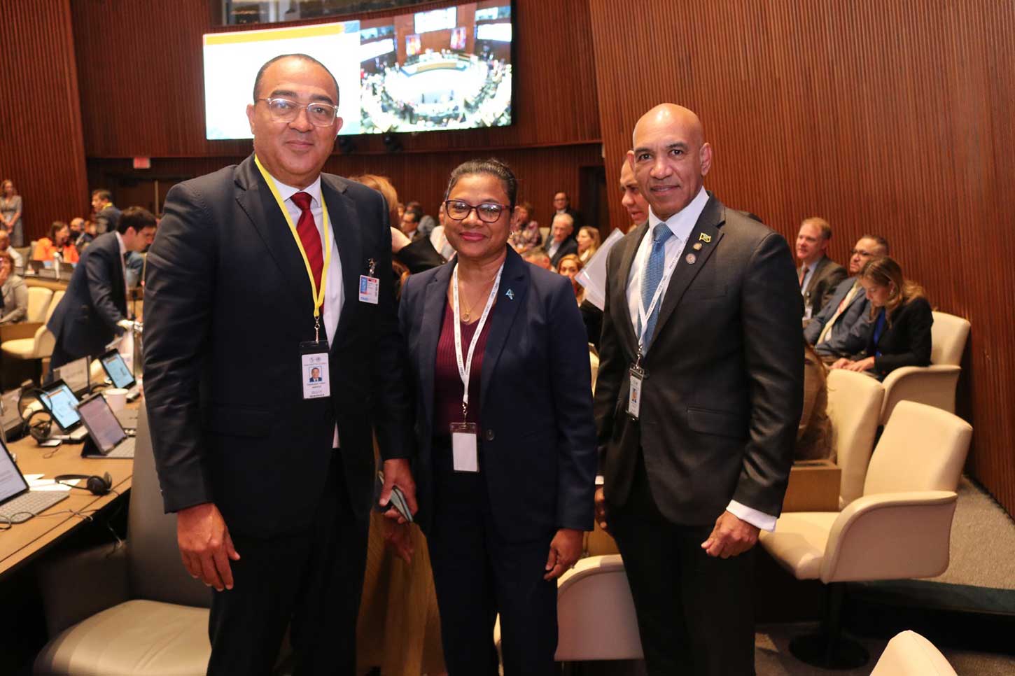 Minister of Health and Wellness, Dr. Christopher Tufton, Chief Medical officer of Health Dr. Jacquiline Bisasor- Mckenzie and Jamaica’s Ambassador to the United States His Excellency Major General (Rtd) Antony Anderson share a light moment the 62nd Directing Council of the Pan American Health Organization (PAHO) at its headquarters in Washington DC Monday September 29.2025. Photo Derrick Scott.