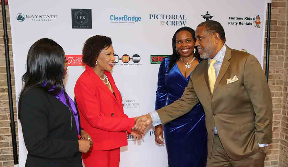 Jamaica's Ambassador to the United States, Her Excellency Audrey Marks receives a warm welcome from New York State Senator Kevin Parker on her arrival at International Women’s Conference to deliver the keynote address at Hofstra University in Hempstead, New York on Saturday March 9th, 2024. Looking on from left to right at Jamaica’s consul general in New York, Alsion Wilson, and Dr. Neva Alexander, Chief Executive Officer, Neva Alliance. (Photo Derrick Scott).