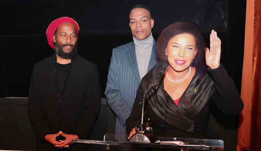 Jamaica’s Ambassador to the United States Audrey Marks, delivers remarks at a special screening of the BOB MARLEY: ONE LOVE film at the Motion Pictures Association in Washington, on Tuesday February 13. Looking on are Ziggy Marley, son of Bob Marley, and Director of the BOB MARLEY: ONE LOVE film Reinaldo Marcus Green.(Photo Derrick Scott)